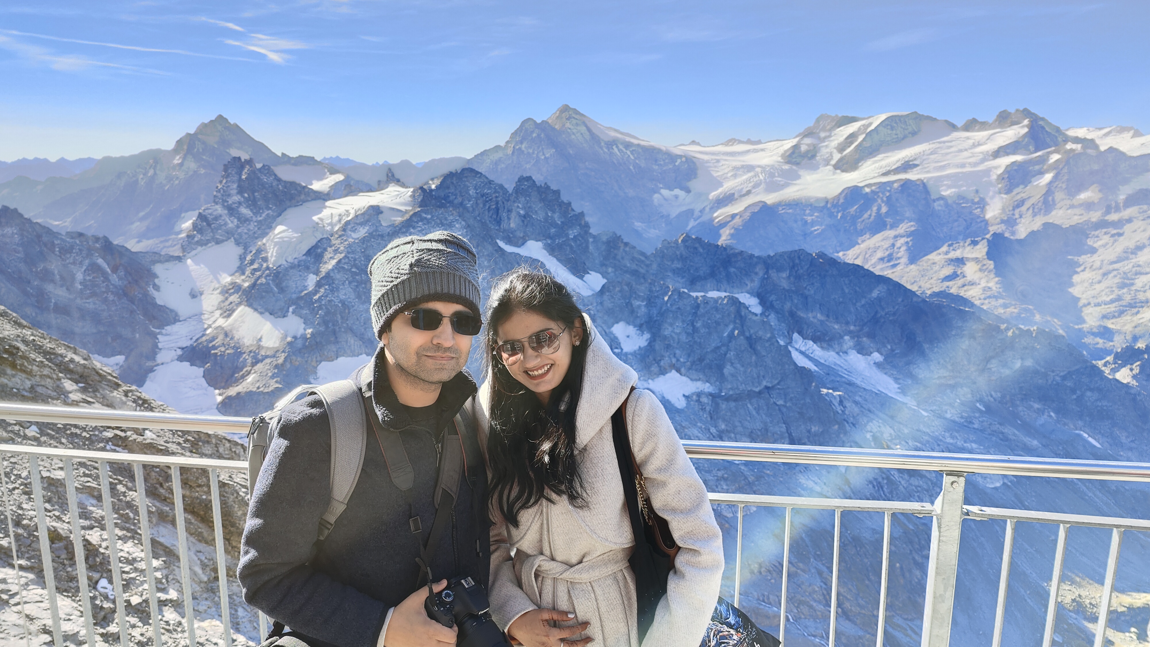 Couple traveling the world, illustrating the homepage of Two Passports One Life travel blog