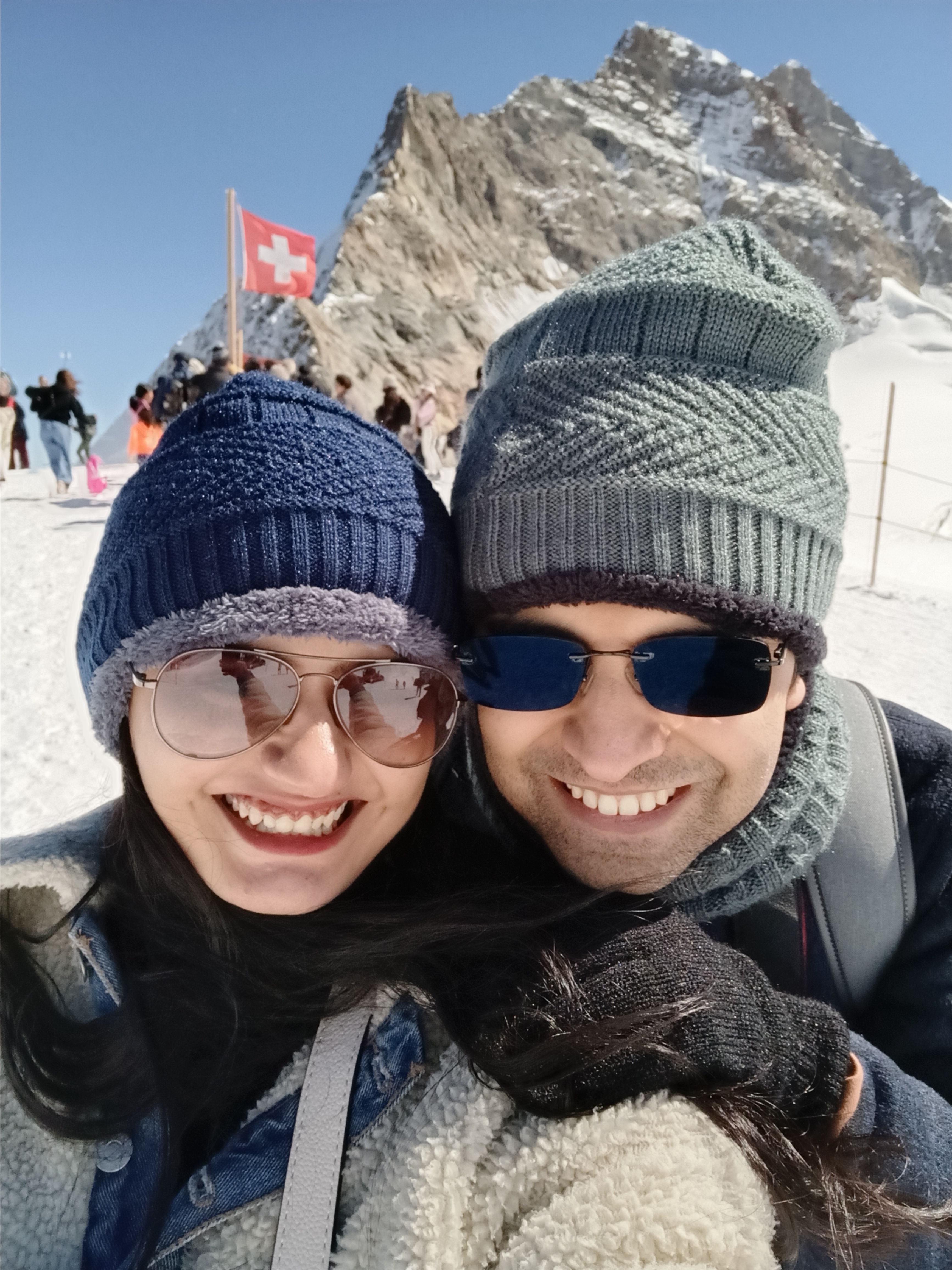 Pulkit and Pritha posing for a selfie in the snow at Jungfrau, Switzerland.